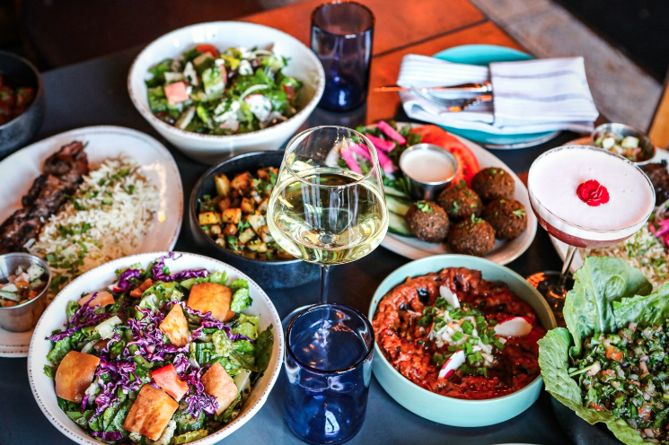 Chicago happy hour dishes on a restaurant table